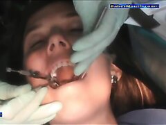 Woman Getting Drilled At The Dentist