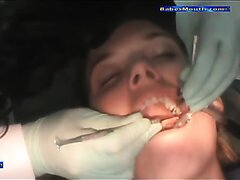Woman Getting Drilled At The Dentist