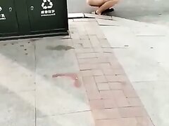 Chinese Woman Pees In The Street