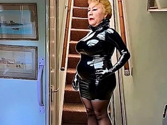Cathy Slut Granny At Home Walks Up Stairs In Hot PVC Costume